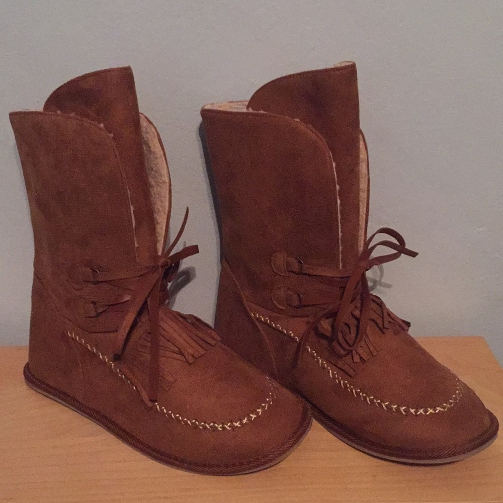 Brown fringe JustFab boots with stitch detailing